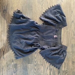 Beautiful top with lace details and waist tie